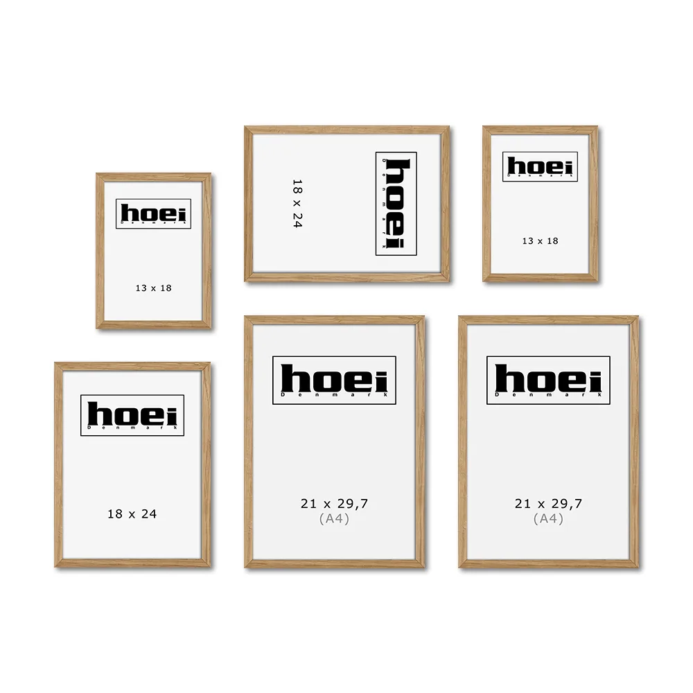 Billedvæg med massive egetrærammer