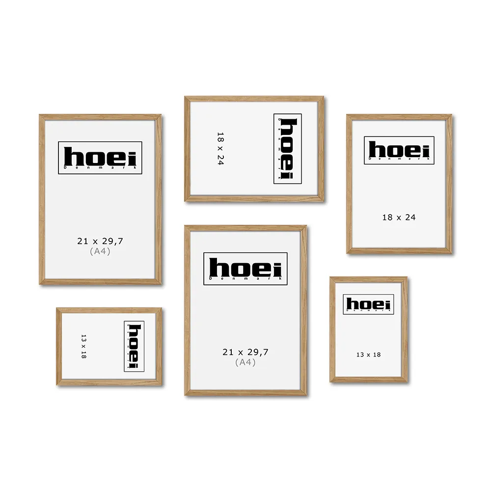 Billedvæg med massive egetrærammer