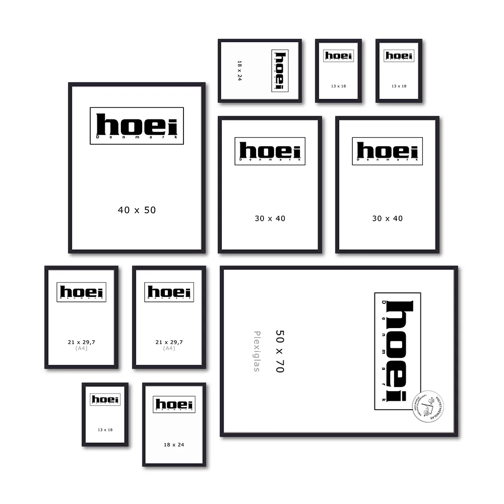 Sort rammevæg Rammevæg med 11 sorte trærammer til at lave din egen billedvæg