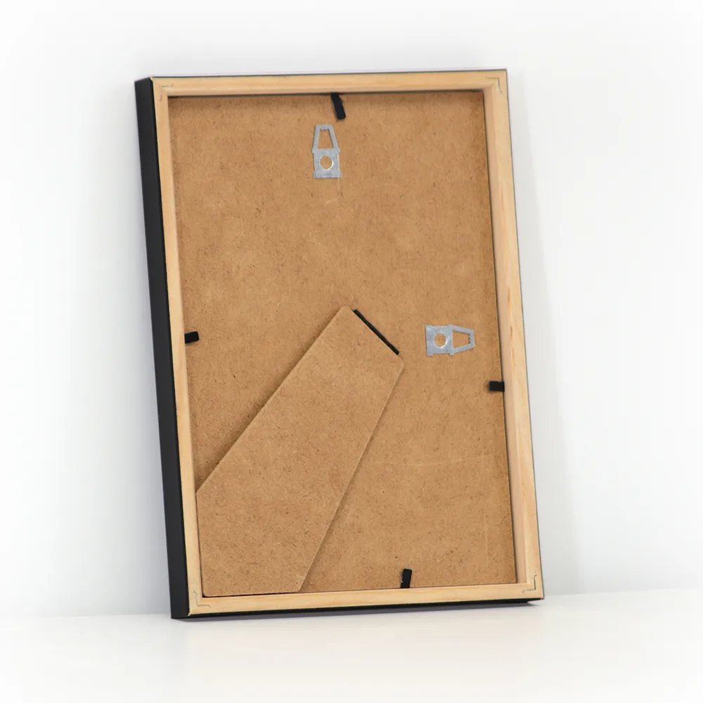 Sort træramme i størrelsen 15x21 cm. med almindelig glas