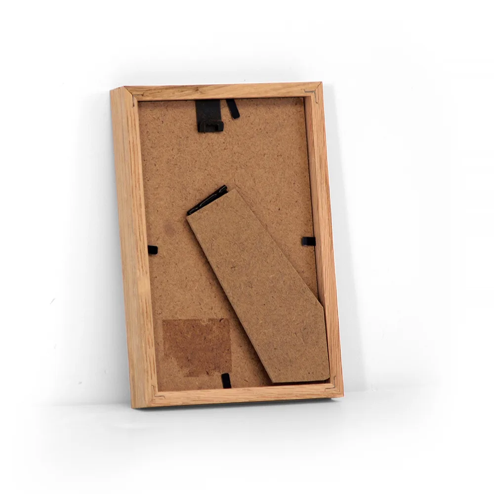 Massiv egetræsramme 10x15 cm med glas og bagstøtte