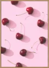 Cherries on pink background