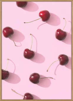 Cherries on pink background